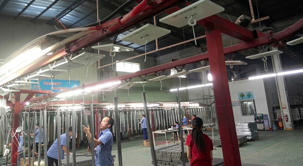 BEVIS powder coating production line preparing retail fixture components